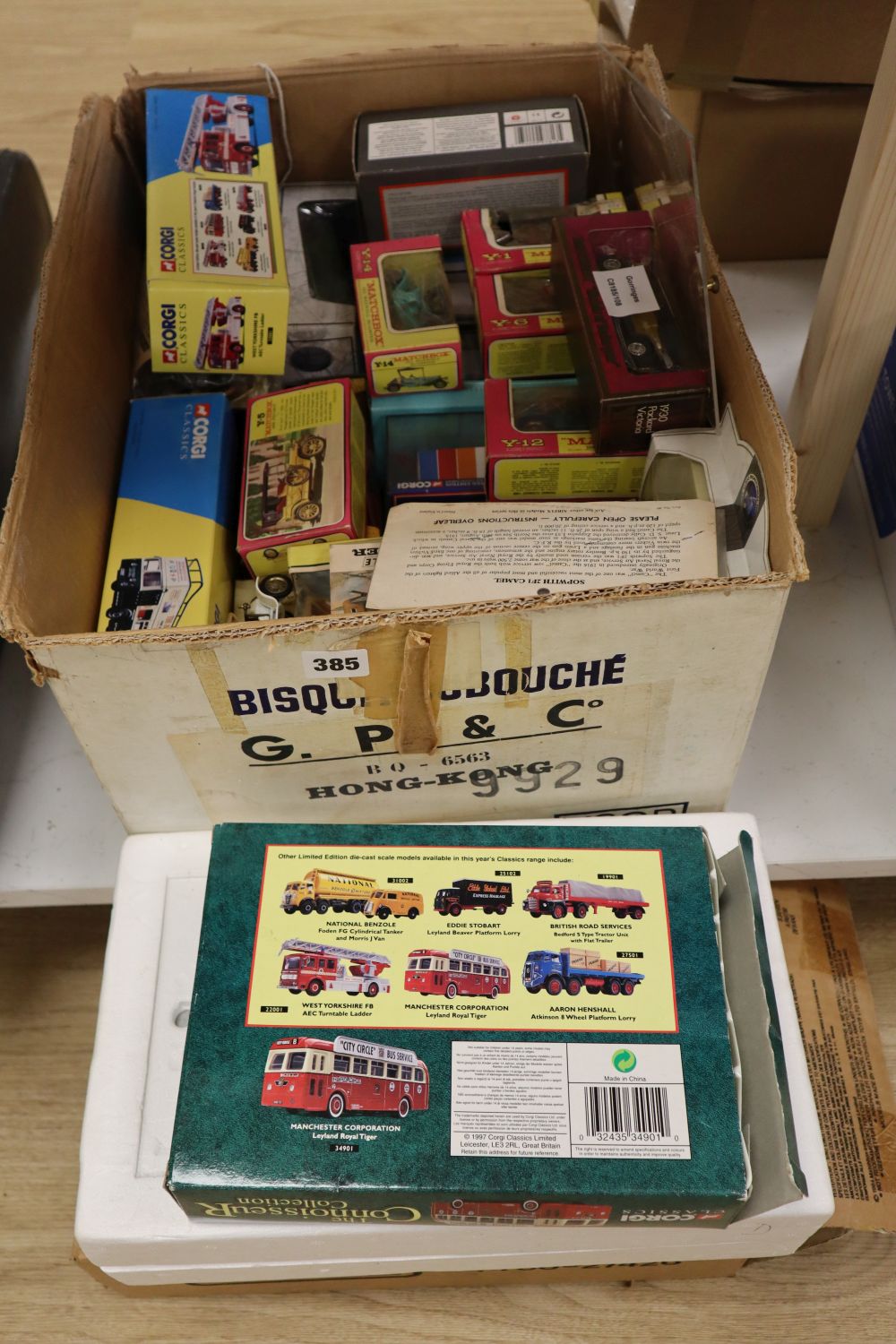 A collection of sixteen Matchbox die cast buses and other vehicles, many with original boxes